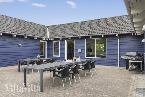 Nyd en grillaften på terrassen i luksushus nr. 314 i Lolland/Falster/Møn