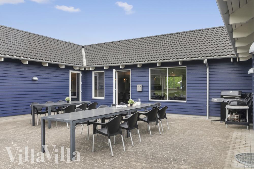 Nyd en grillaften på terrassen i luksushus nr. 314 i Lolland/Falster/Møn