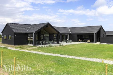 Dette skønne poolhus nr. 932 med plads til 20 personer ligger i Fyn og øer