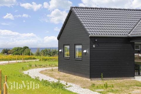 Det skønne område Fyn og øer indbyder til et ophold i luksushus nr. 932.