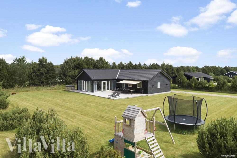 Luksushus nr. 969 har en dejlig terrasse med gode havemøbler til 12 personer.