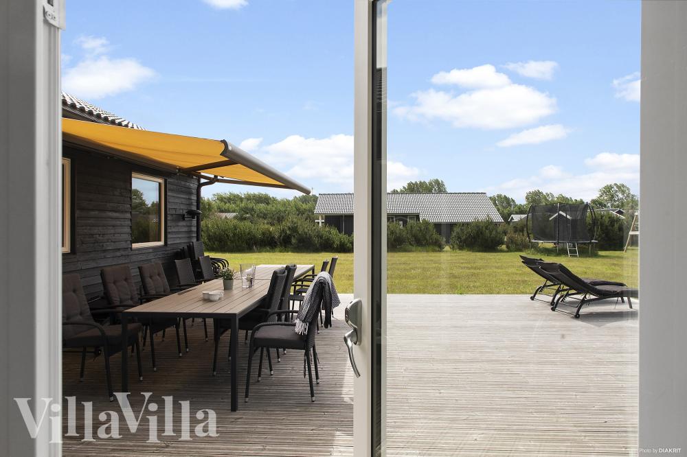 Nyd en grillaften på terrassen i luksushus nr. 969 i Lolland/Falster/Møn