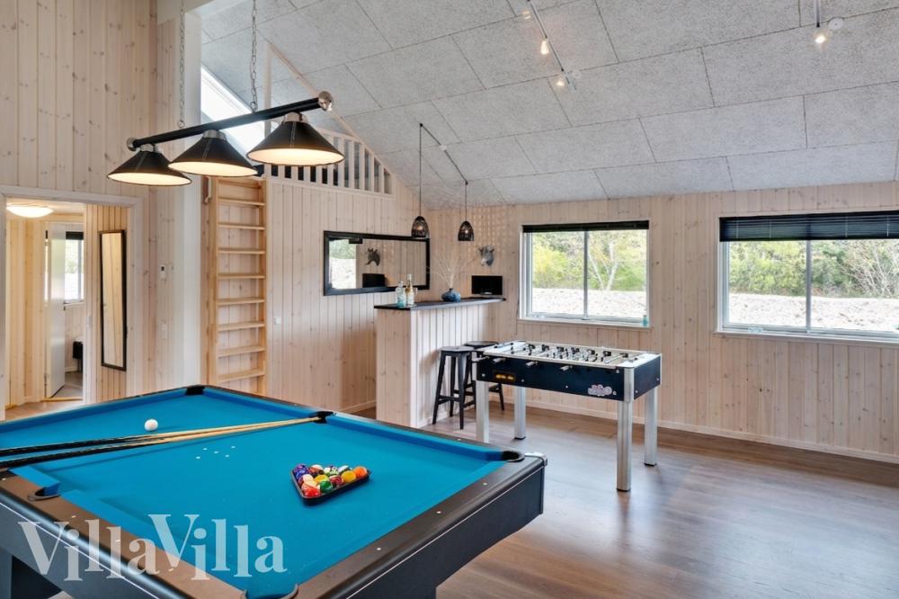 Ud over de mange timer, man kan bruge i husets pool-afdeling, så byder luksushus 463 også på billard/bordtennis og dart
