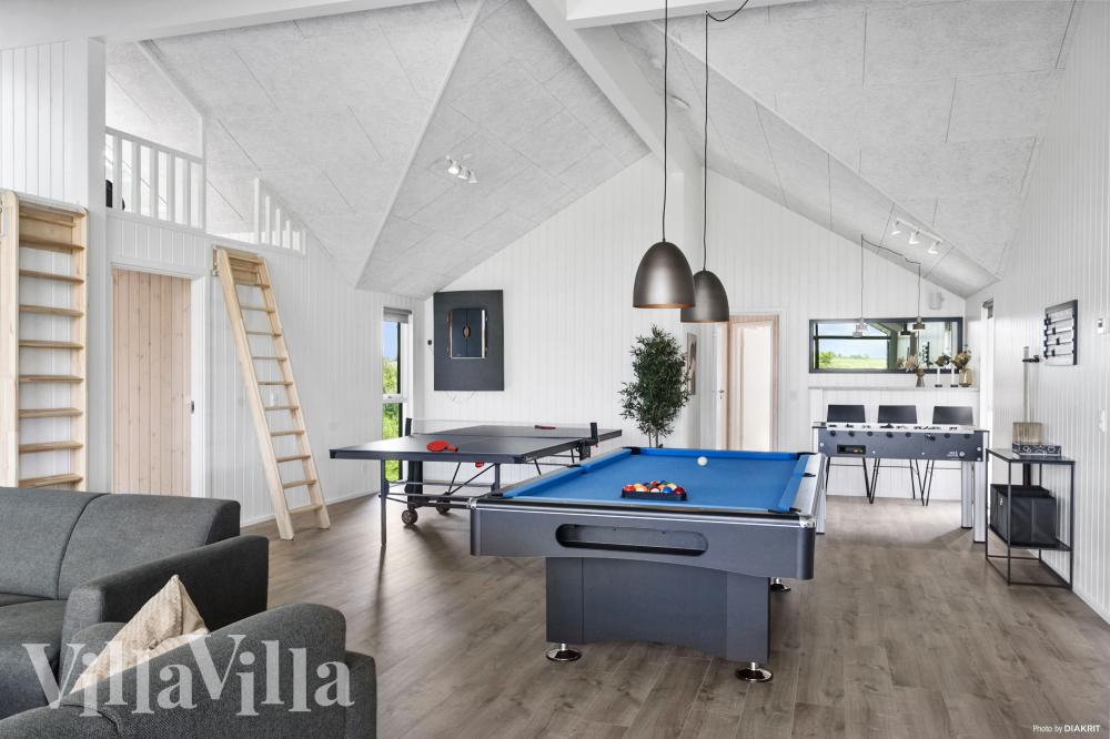 Ud over de mange timer, man kan bruge i husets pool-afdeling, så byder luksushus 923 også på billard/bordtennis og dart