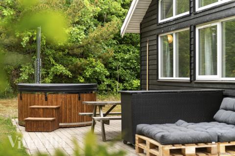 Nyd varmen i spaen i luksushus nr. 313 i Vestjylland