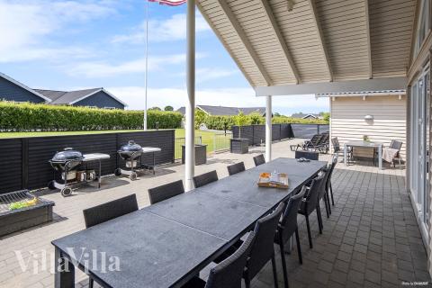 Nyd en grillaften på terrassen i luksushus nr. 315 i Fyn og øer