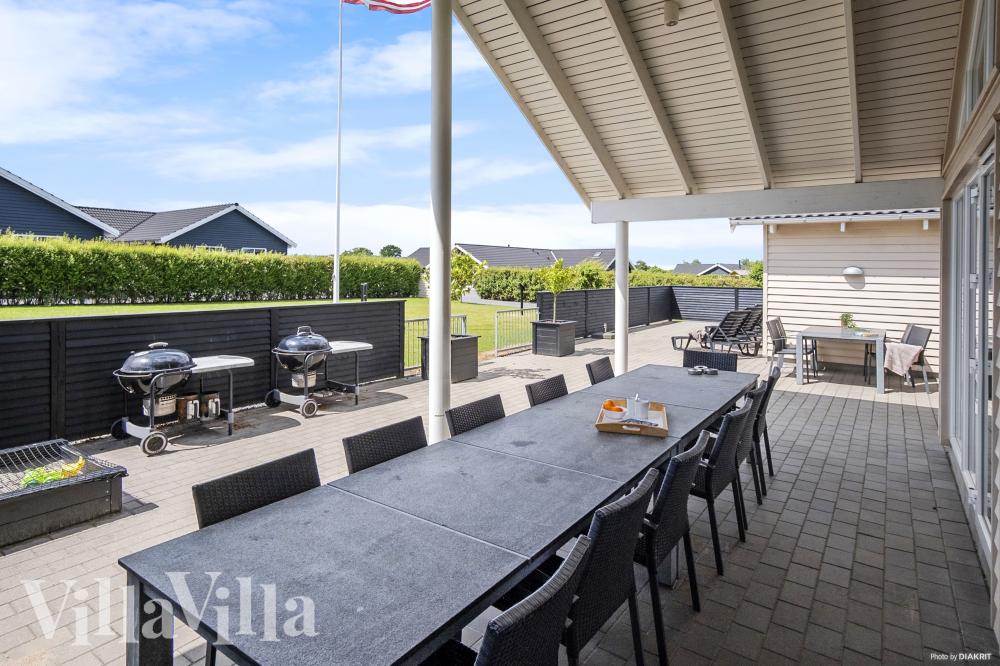 Nyd en grillaften på terrassen i luksushus nr. 315 i Fyn og øer