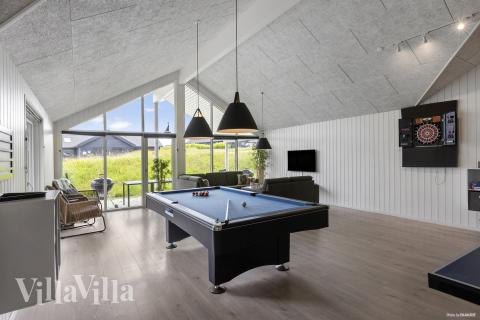 Ud over de mange timer, man kan bruge i husets pool-afdeling, så byder luksushus 491 også på billard/bordtennis og dart