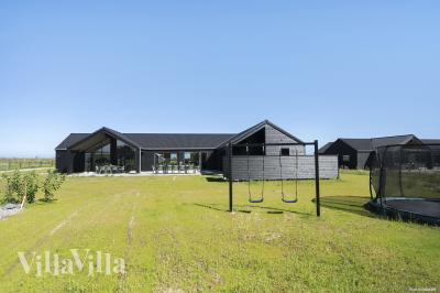 Dette skønne poolhus nr. 932 med plads til 20 personer ligger i Fyn og øer