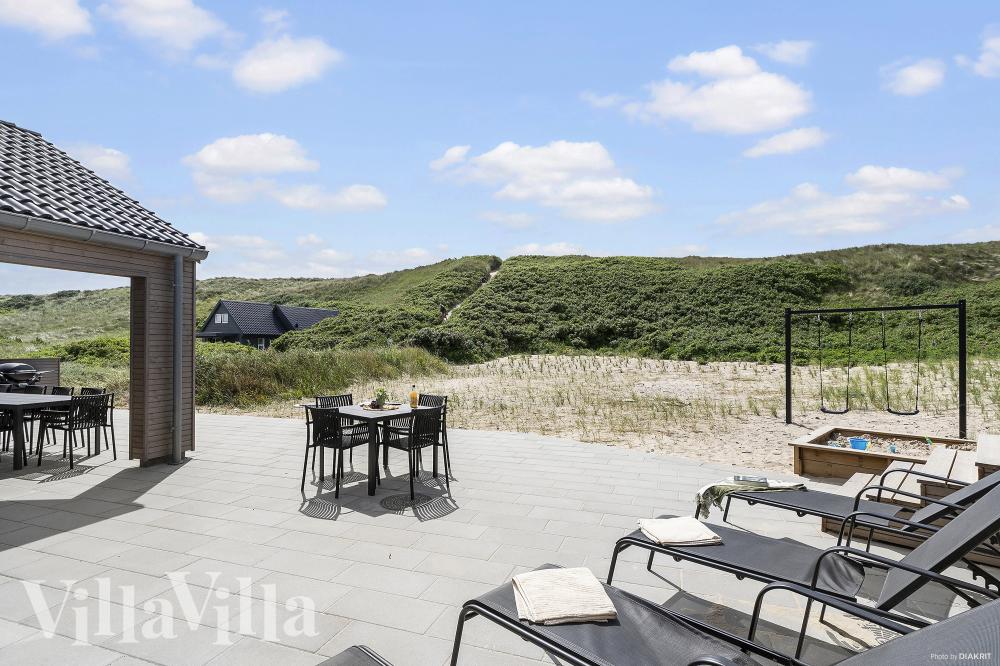 Luksushus nr. 900 har en dejlig terrasse med gode havemøbler til 18 personer.