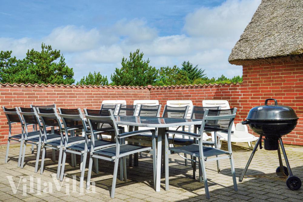 Nyd en grillaften på terrassen i luksushus nr. 989 i Vestjylland