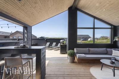 Luksushus nr. 947 har en dejlig terrasse med gode havemøbler til 12 personer.