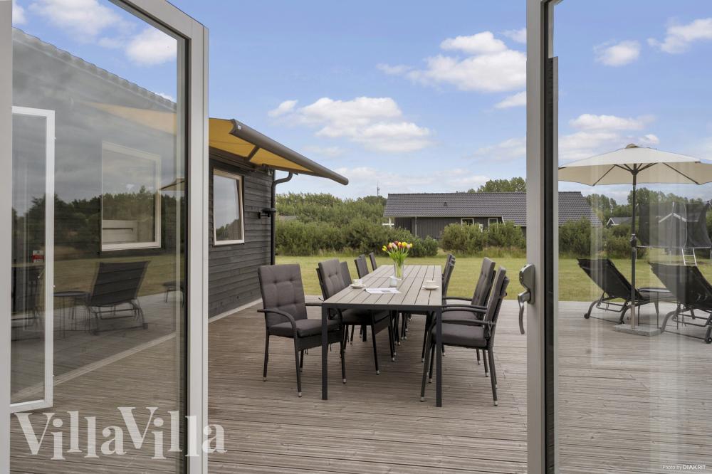 Luksushus nr. 969 har en dejlig terrasse med gode havemøbler til 12 personer.