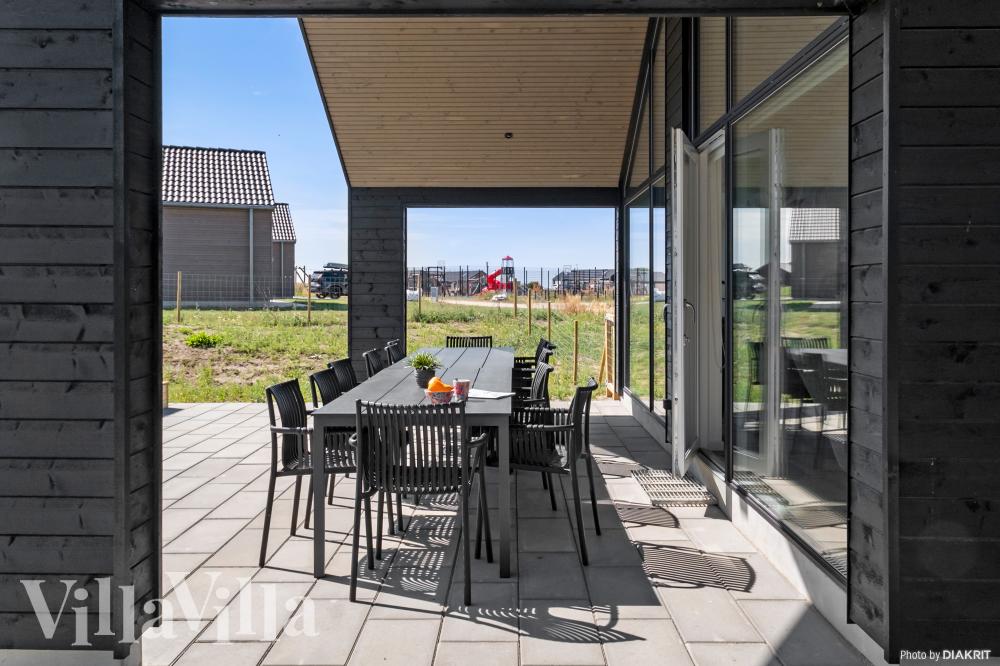 Nyd en grillaften på terrassen i luksushus nr. 921 i Fyn og øer