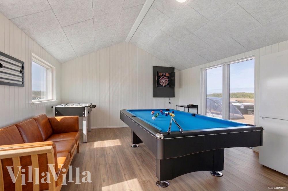 Ud over de mange timer, man kan bruge i husets pool-afdeling, så byder luksushus 669 også på billard/bordtennis og dart
