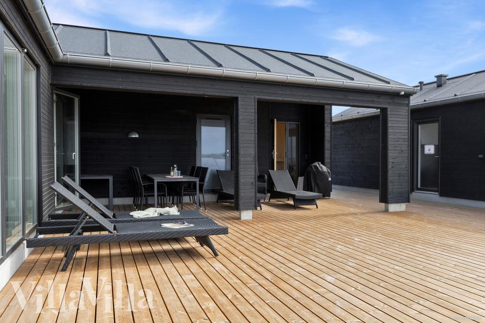 Nyd en grillaften på terrassen i luksushus nr. 669 i Nordjylland