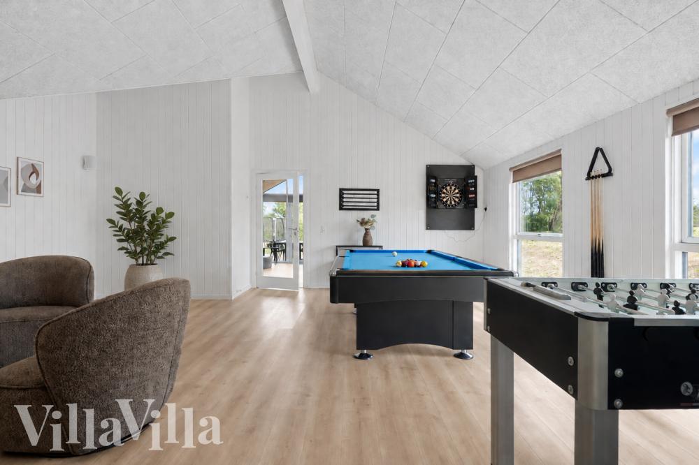 Ud over de mange timer, man kan bruge i husets pool-afdeling, så byder luksushus 1007 også på billard/bordtennis og dart