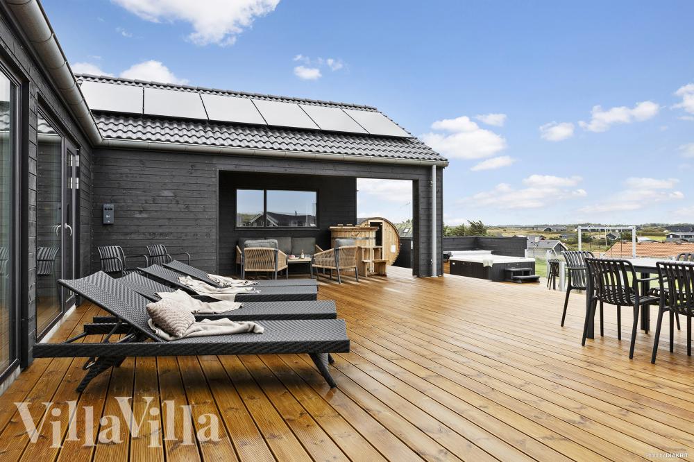 Nyd en grillaften på terrassen i luksushus nr. 959 i Nordjylland