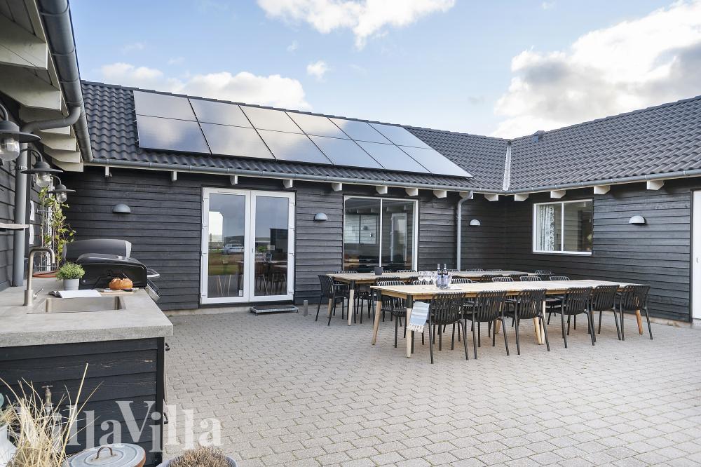 Luksushus nr. 293 har en dejlig terrasse med gode havemøbler til 22 personer.