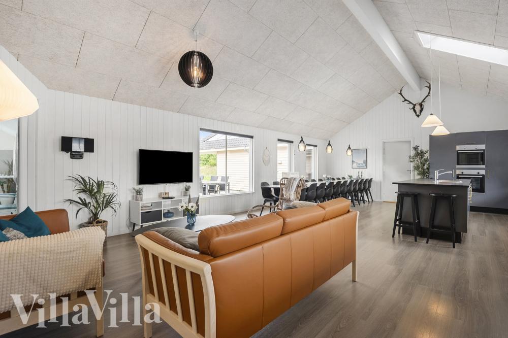 Der er mulighed for hygge i sommerhusets sofaarrangement, når I besøger luksushus nr. 463