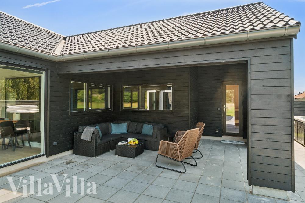 Nyd en grillaften på terrassen i luksushus nr. 1020 i Bornholm