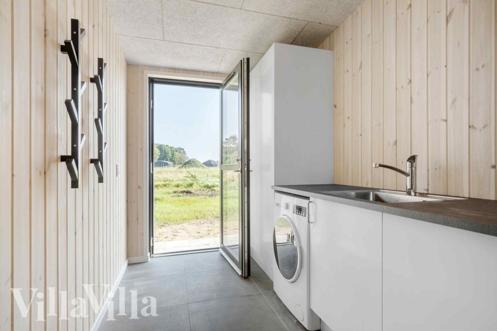 Den rummelige entre i luksushus nr. 1014 i Østjylland
