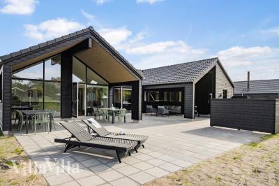 Dette skønne poolhus nr. 904 med plads til 14 personer ligger i Nordsjælland
