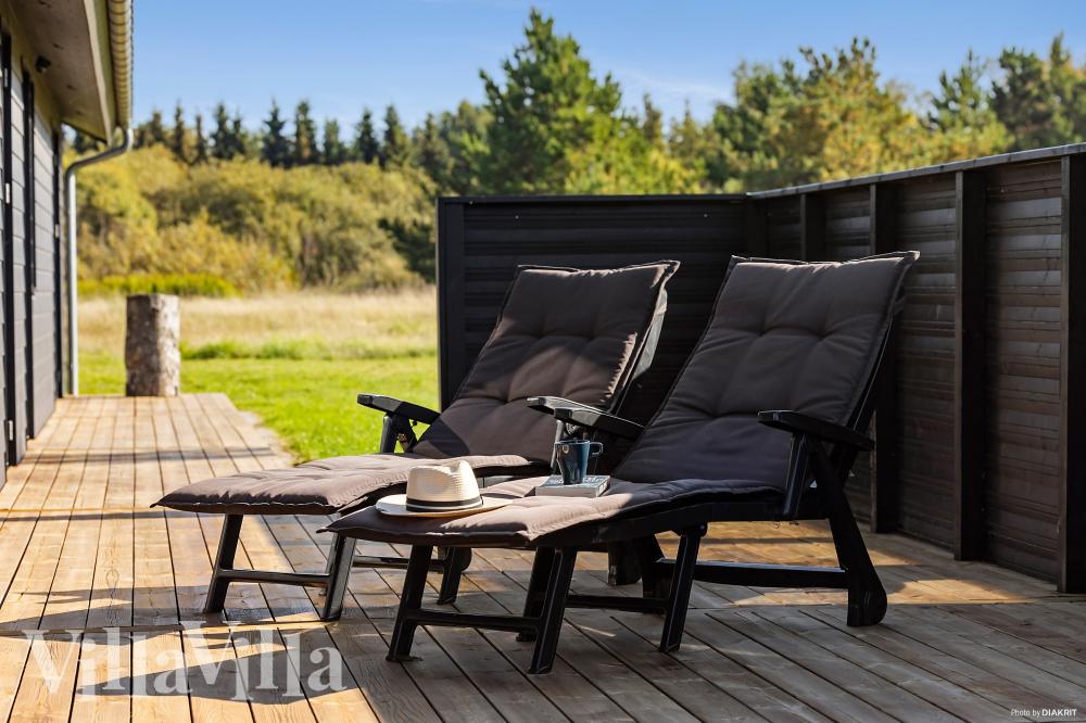 Nyd en grillaften på terrassen i luksushus nr. 1029 i Nordjylland