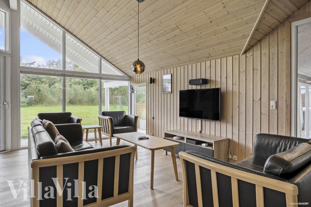 Sofahjørnet i luksushus 236 i Nordjylland.