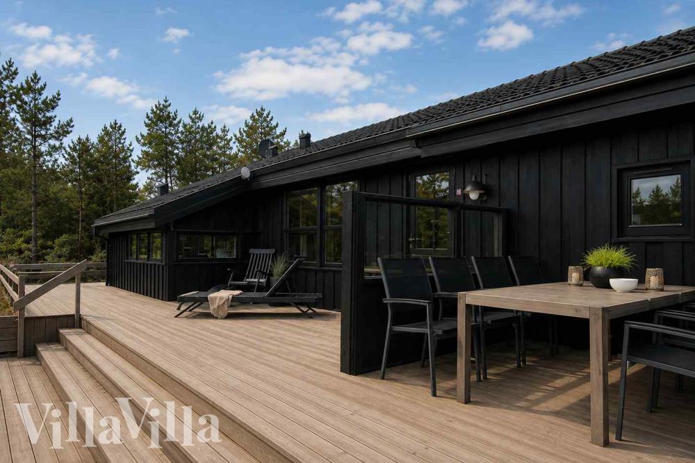 Luksushus nr. 1010 har en dejlig terrasse med gode havemøbler til 16 personer.